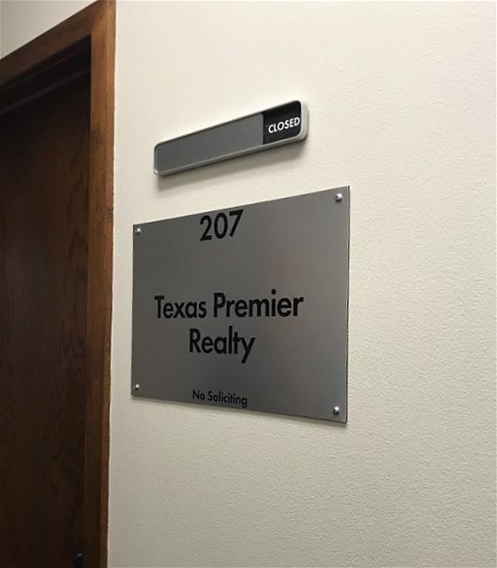 Breeze Property Management wall sign